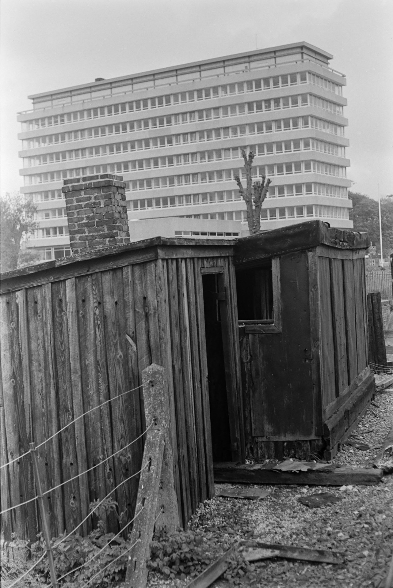 An office block behind wooden sheds at Barnstaple.
