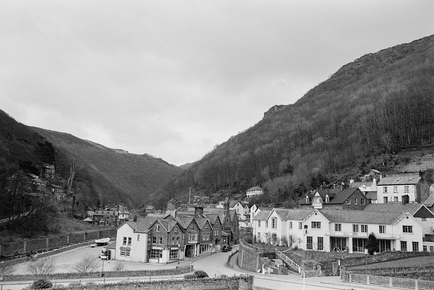 A view of the town of Lynmouth and the wooded valley behind.