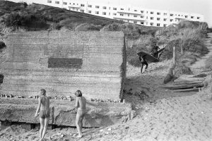 Children playing on the beach by James Ravilious