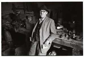 Mr Hatherley in his workshop by James Ravilious