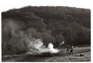 Men burning hedge trimmings by James Ravilious