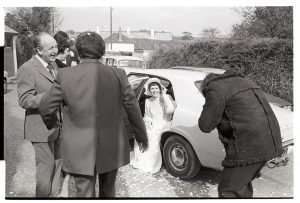 Mary Pugsley being photographed on her wedding day by James Ravilious