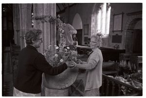 Women arranging flowers for the Jubilee by James Ravilious