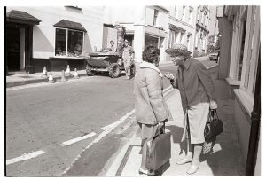 Women chatting in Cornmarket Street by James Ravilious
