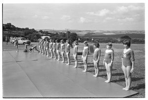 Gymnasts lined up at Atherington Village Fete by James Ravilious