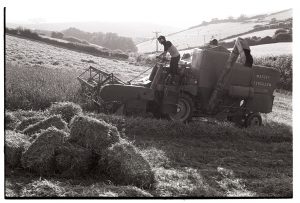 Combine harvester at Kiverleigh by James Ravilious