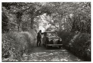 Archie Parkhouse chatting to driver of Baby Austin by James Ravilious