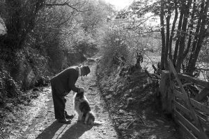 Archie Parkhouse and his dog Sally by James Ravilious