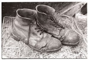 George Ayre’s boots by James Ravilious