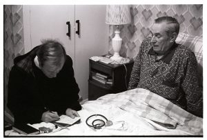 Dr Richard Westcott visiting a patient by James Ravilious