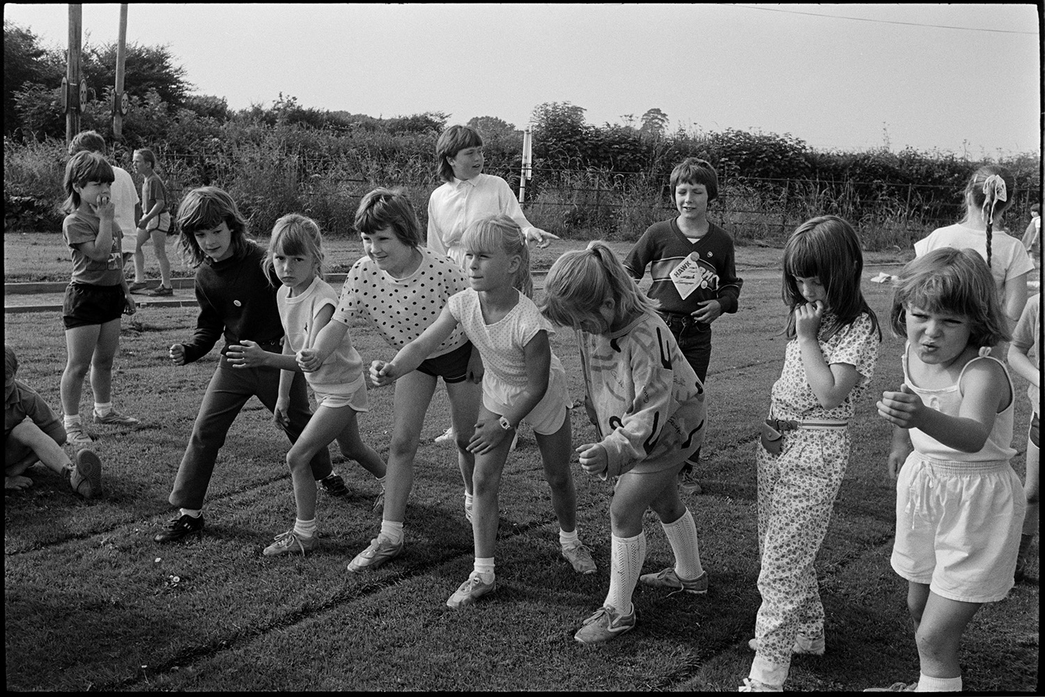 Children's sports.
[A group of girls lining up for the start of a race on Sports Day at Chulmleigh.]