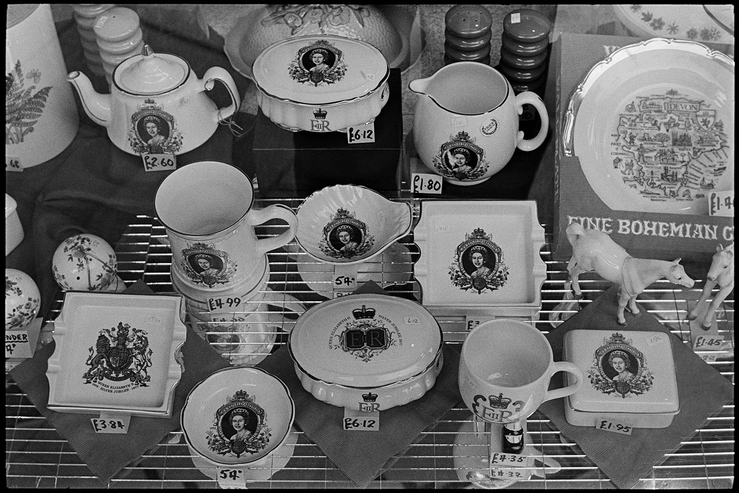 China displayed in shop, Queen's Jubilee. 
[A display of china for Queen Elizabeth II Silver Jubilee in a shop in Barnstaple.]