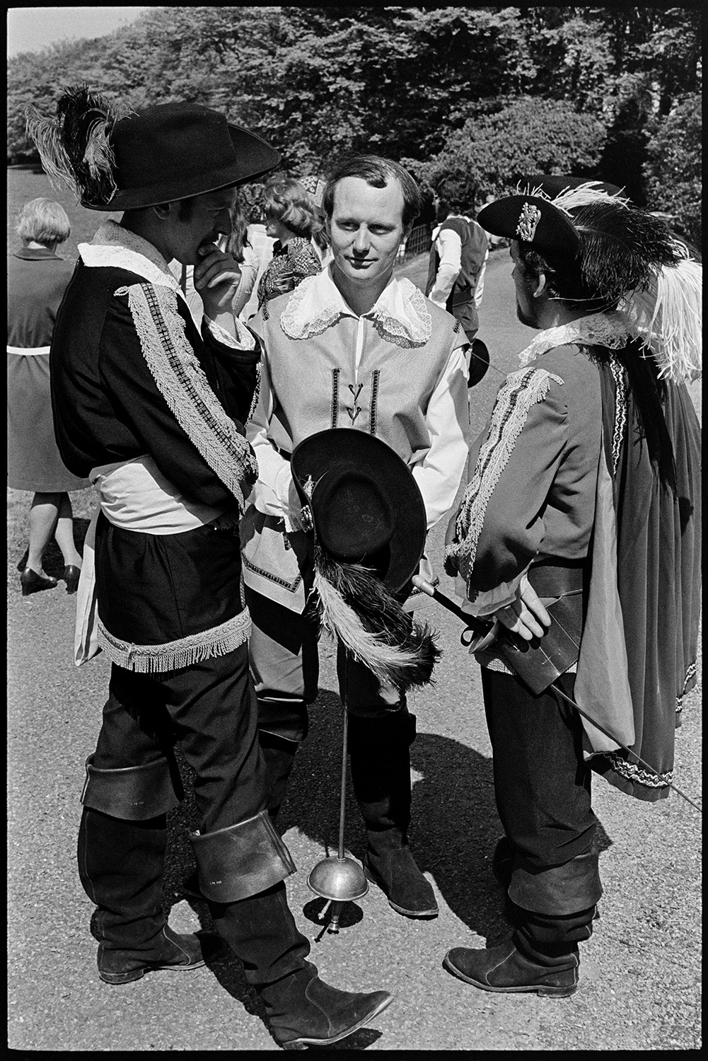 People preparing for Gymkhana. Cavaliers dressing as Wombles in aid of the handicapped. 
[Members of the Torrington Cavaliers in period dress at a fete at Cross House, Torrington to raise money for the Riding for the Disabled Association.]