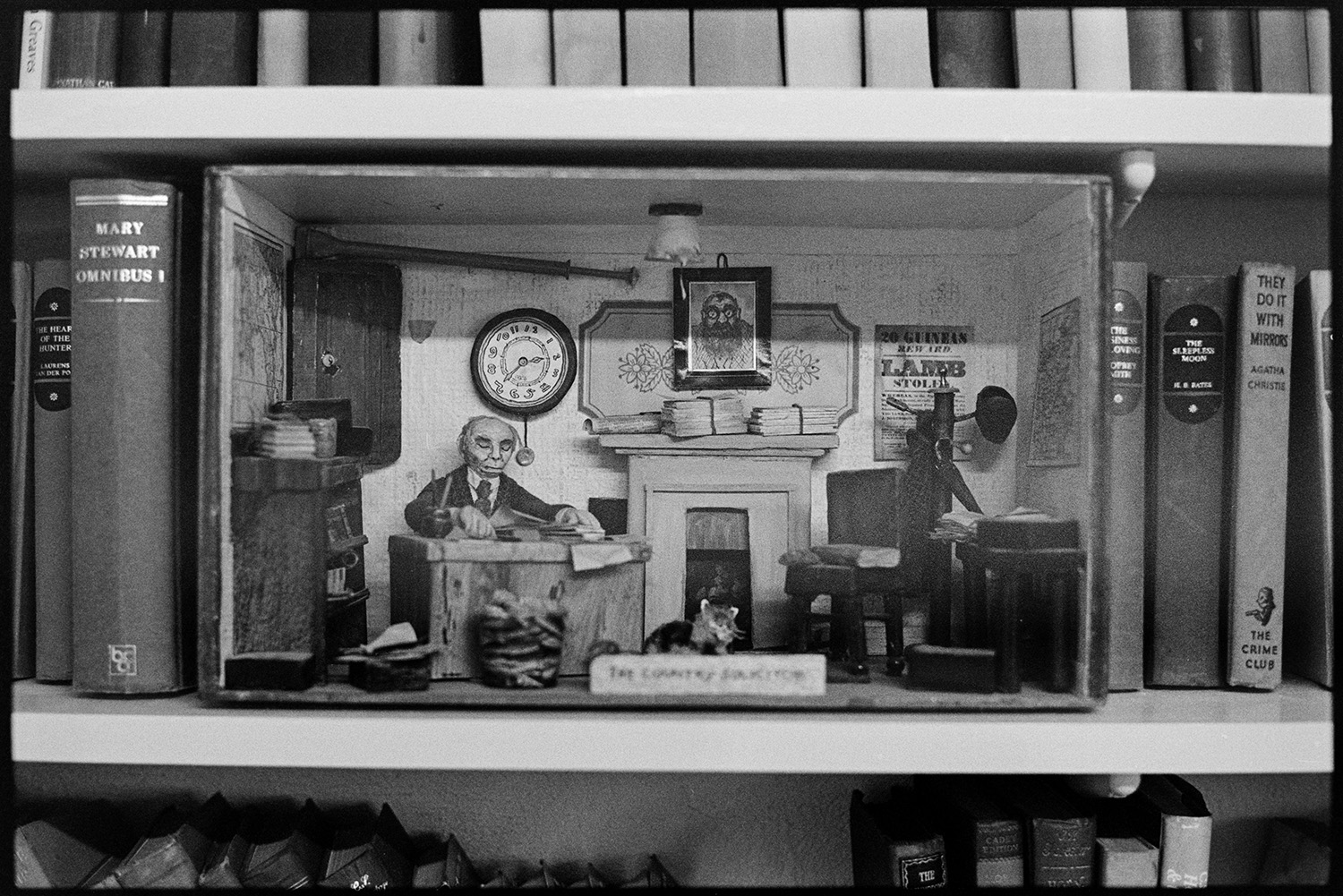 Model of solicitors office made by Cecile Joynson. 
[A model of a solicitors office made by Cecile Joynson. It is on a bookshelf in a house in Brightly, Dolton.]